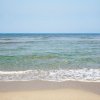 Mare e spiaggia sabbiosa.